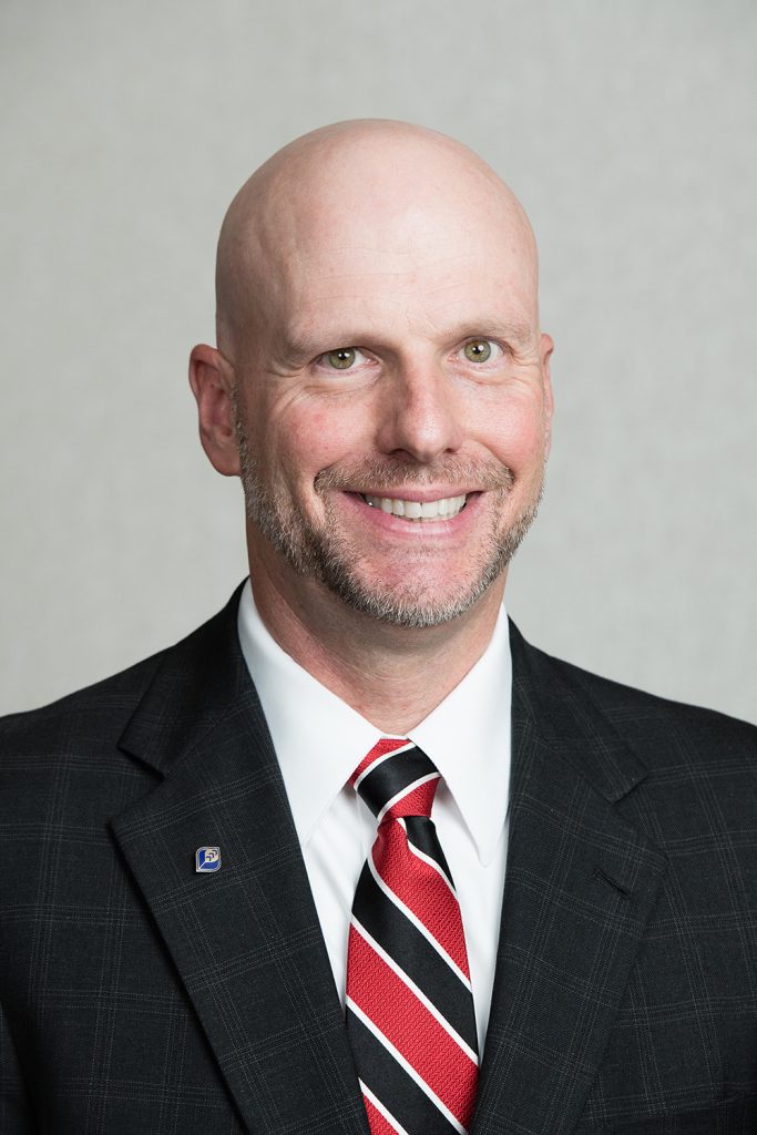 headshot of Darren Armstrong