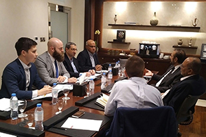 image of Discussions taking place at a table in Dubai