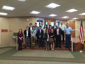People Standing On Staircase for Photo
