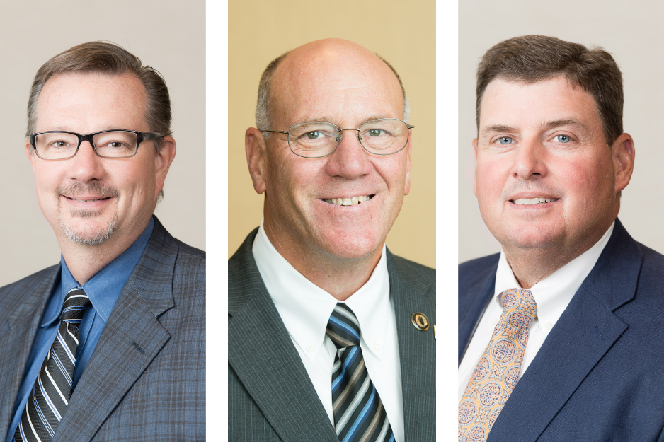 headshots of three men in suits
