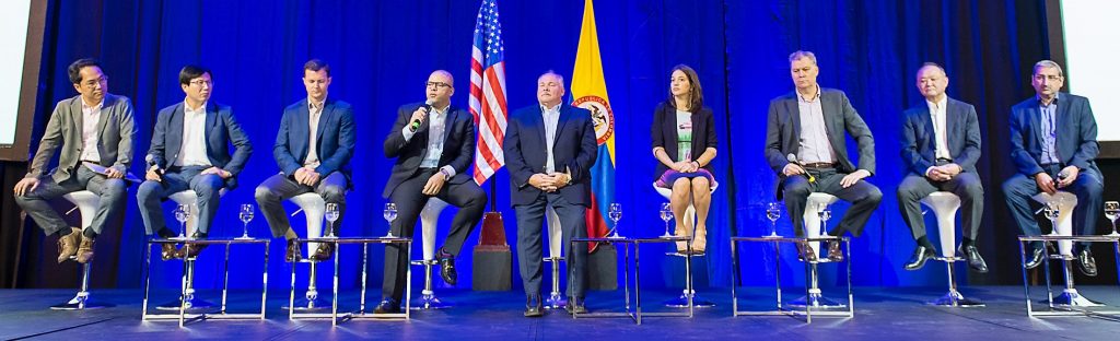 Nine People Sitting On Stage