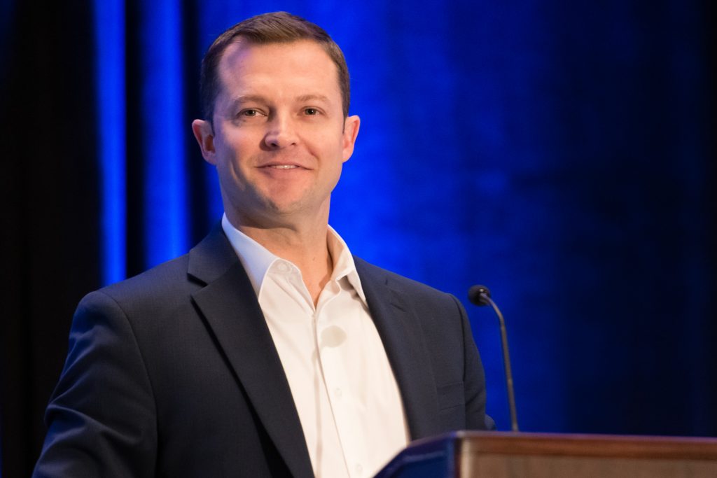 Ryan LeGrand standing at podium
