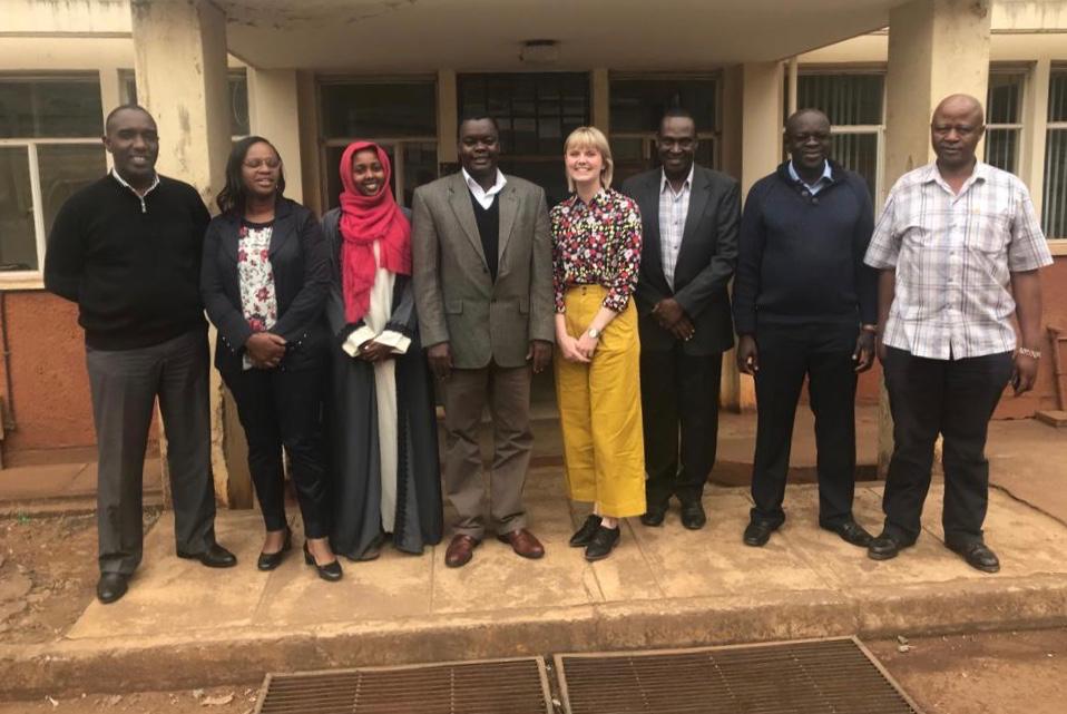 Kenya MOU signing- participants standing in front of a building
