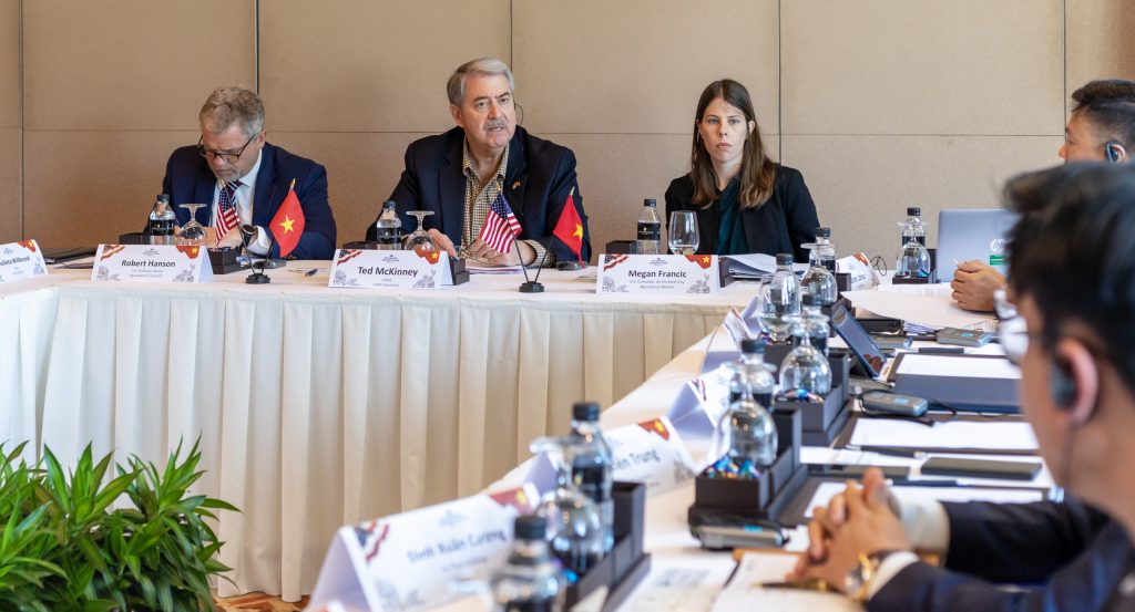 USDA ATM to Vietnam_Roundtable- 5 attendees engaged in a conversation while seated