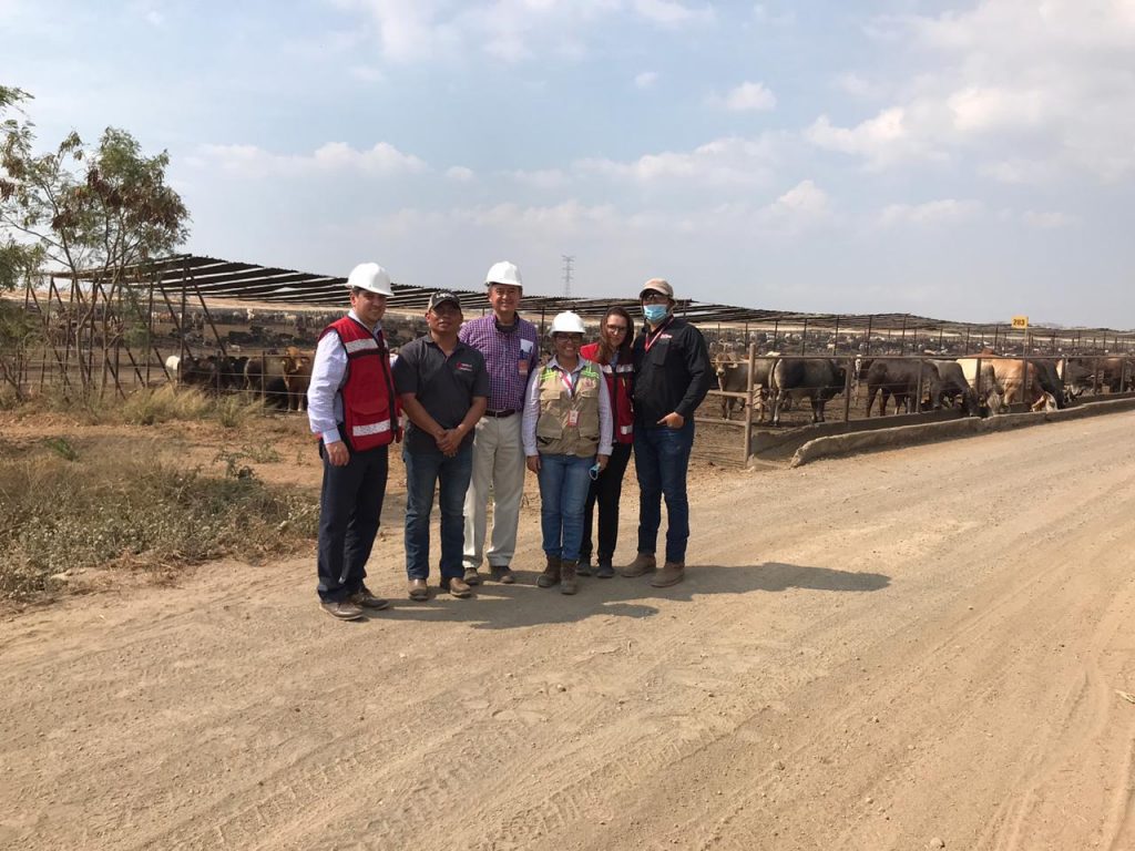 six people wearing hats smiling for a photo in Nicaragua