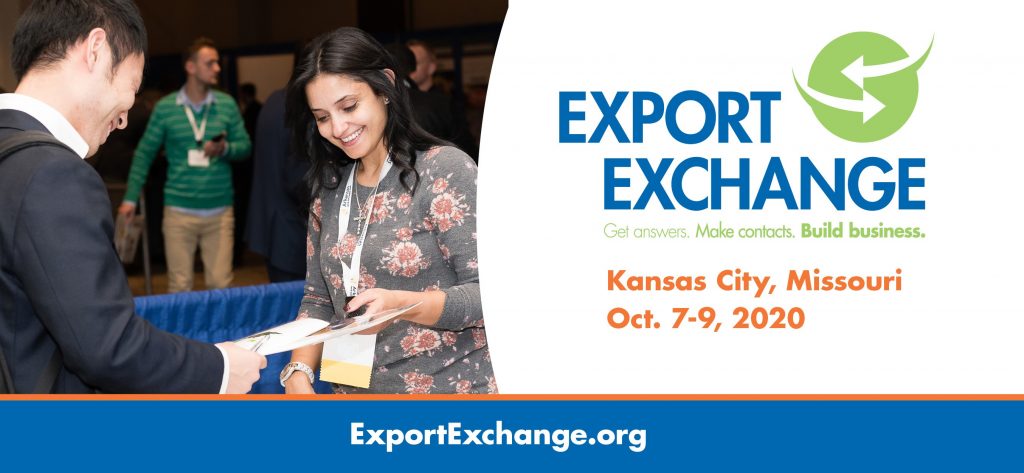 Man Handing Woman Paper Next to Export Exchange Meeting Advertisement