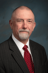 headshot of Jon Doggett