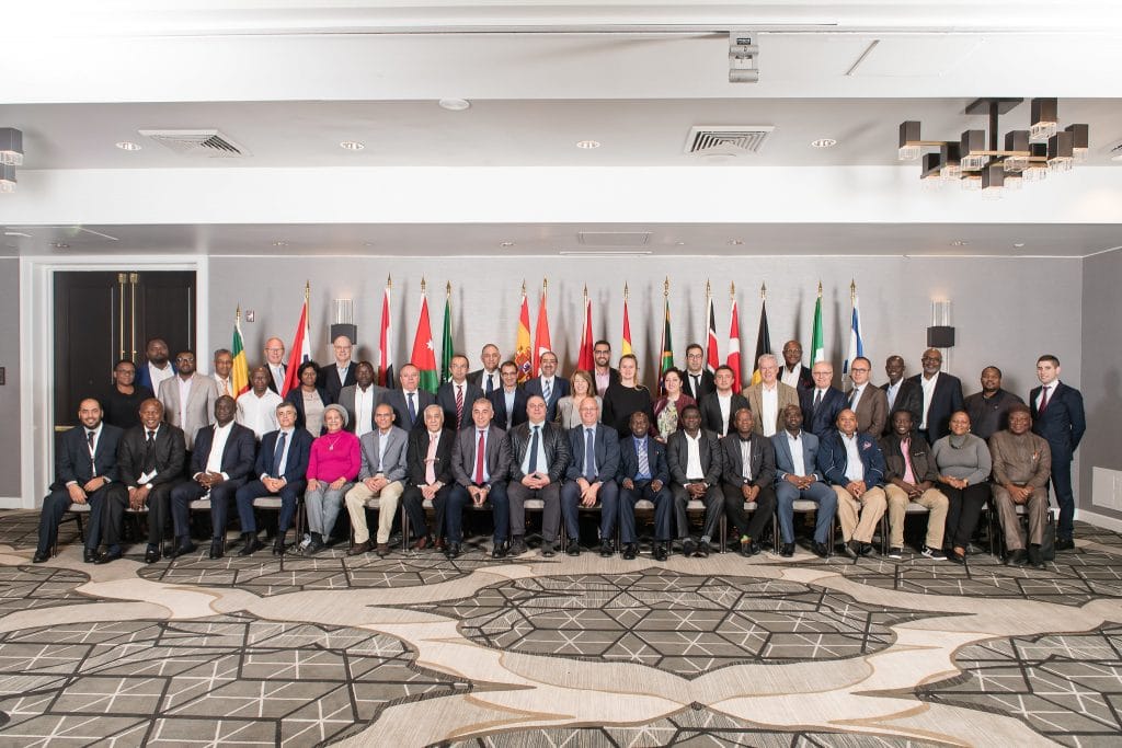 People in Front of Flags