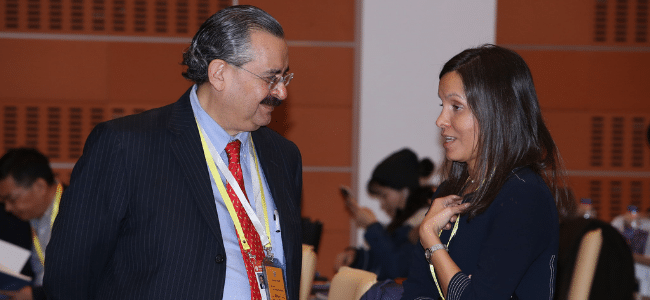 Man with Glasses Talking With Woman