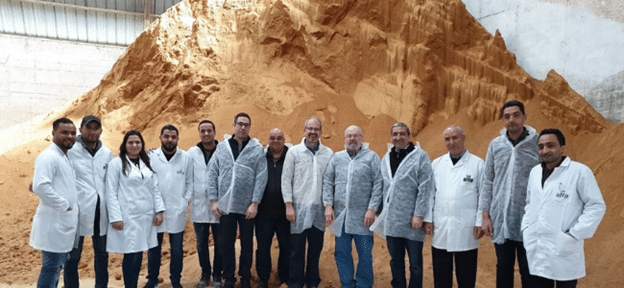 Thirteen People Standing For Picture