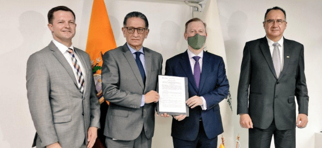 Men signing a document