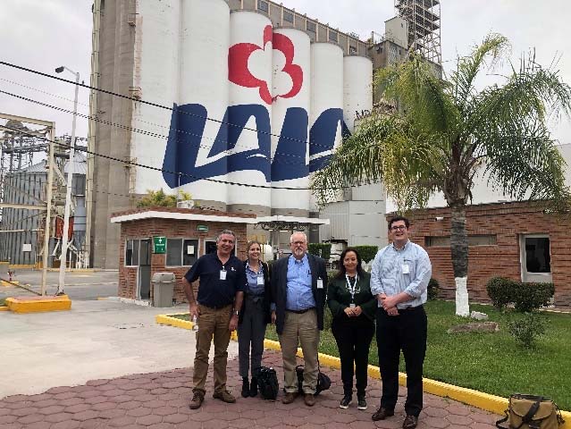 Group of people posing for photo