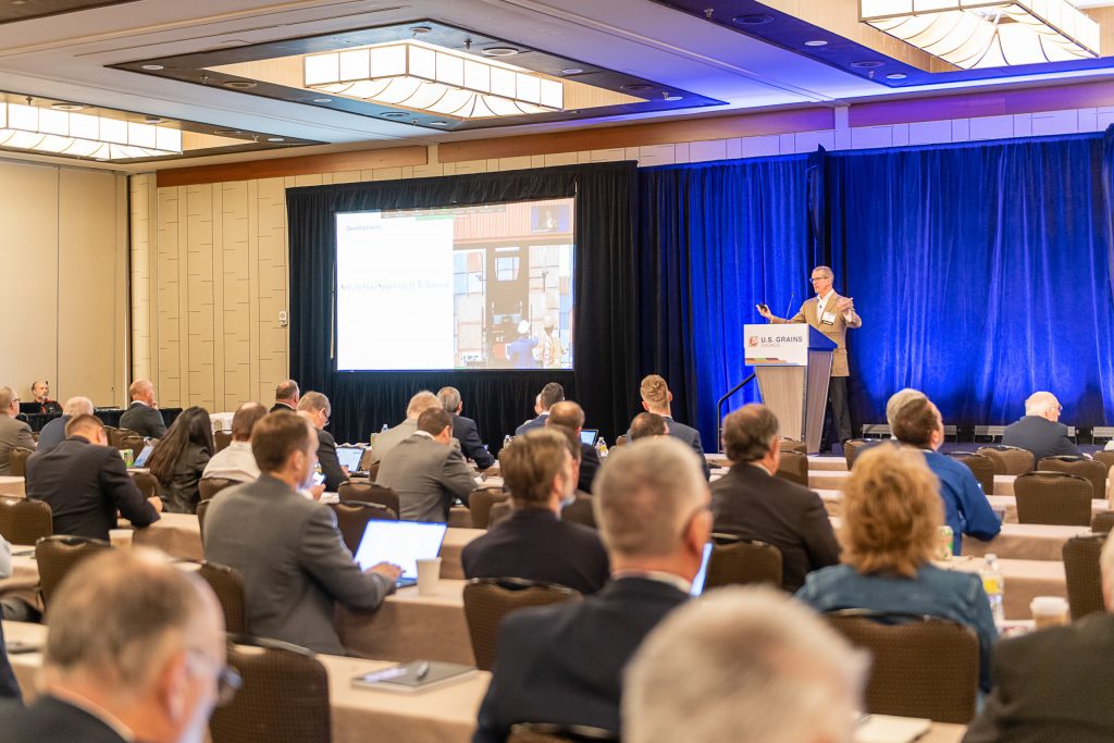 image of a man speaking to a crowd