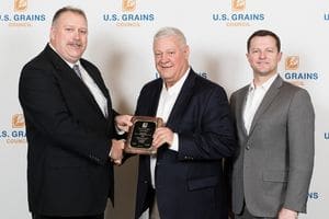 Image of man receiving award