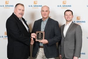 Image of man receiving award