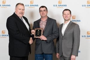 Image of man receiving award