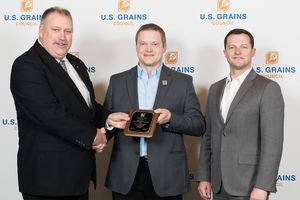 image of a man being handed an award