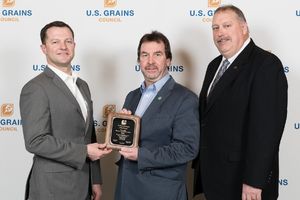 image of a man being handed an award