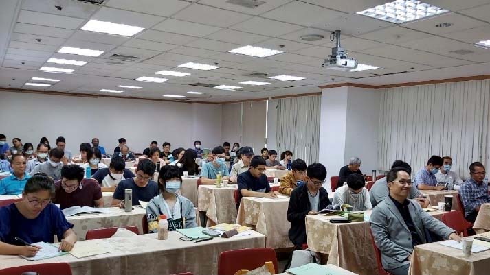 Image of people at a conference