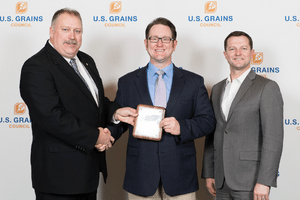 Image of man receiving award