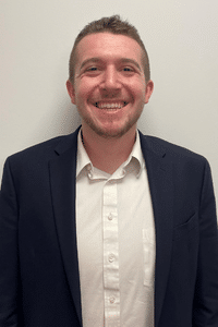 Image of a man smiling for photo