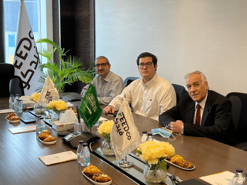 image of three men sitting at a table
