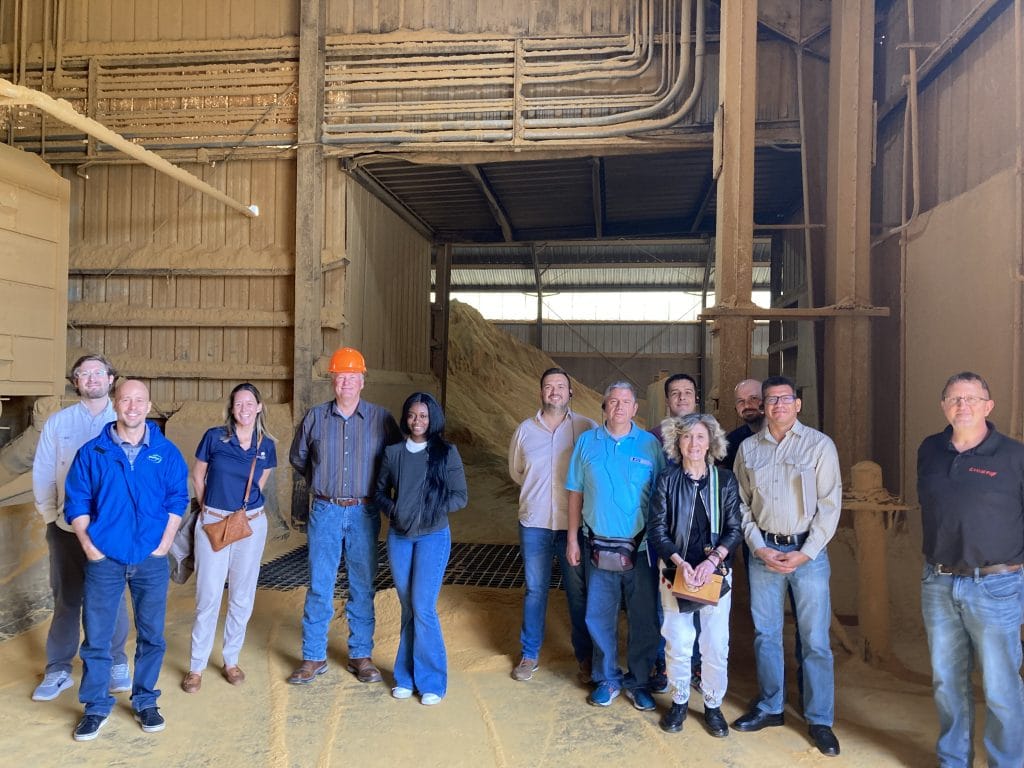 a group of people smiling for a photo
