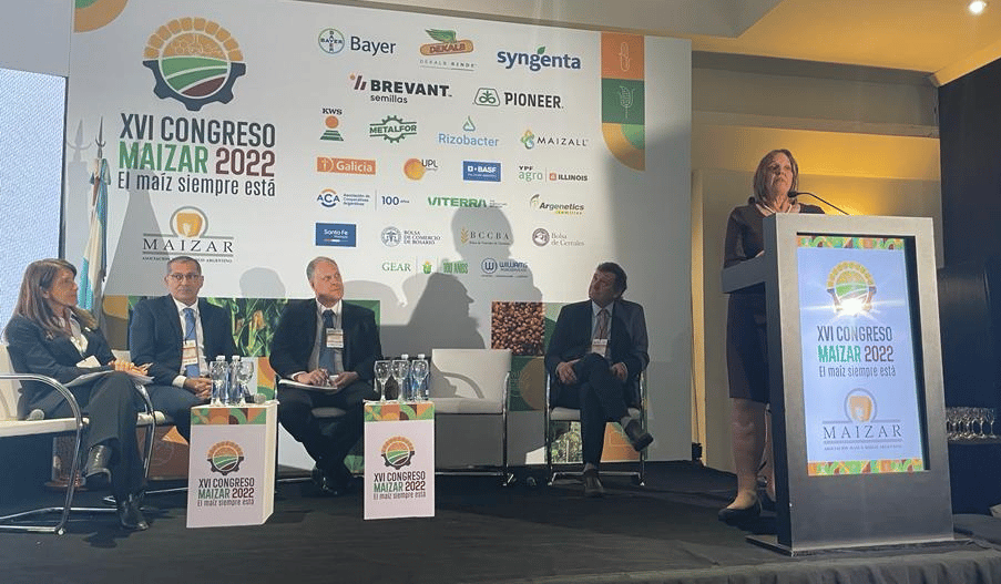 Image of woman speaking at a podium