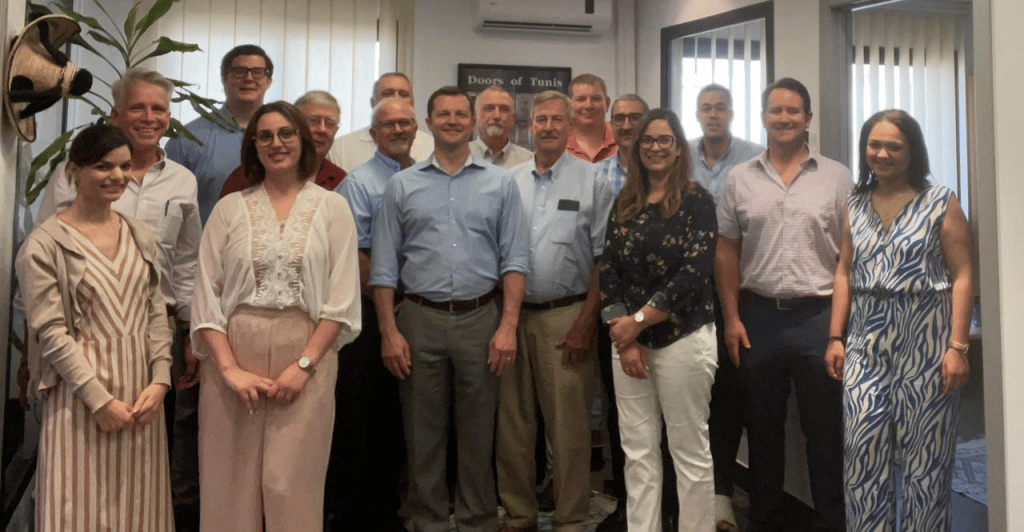 a large group of people posing for a photo