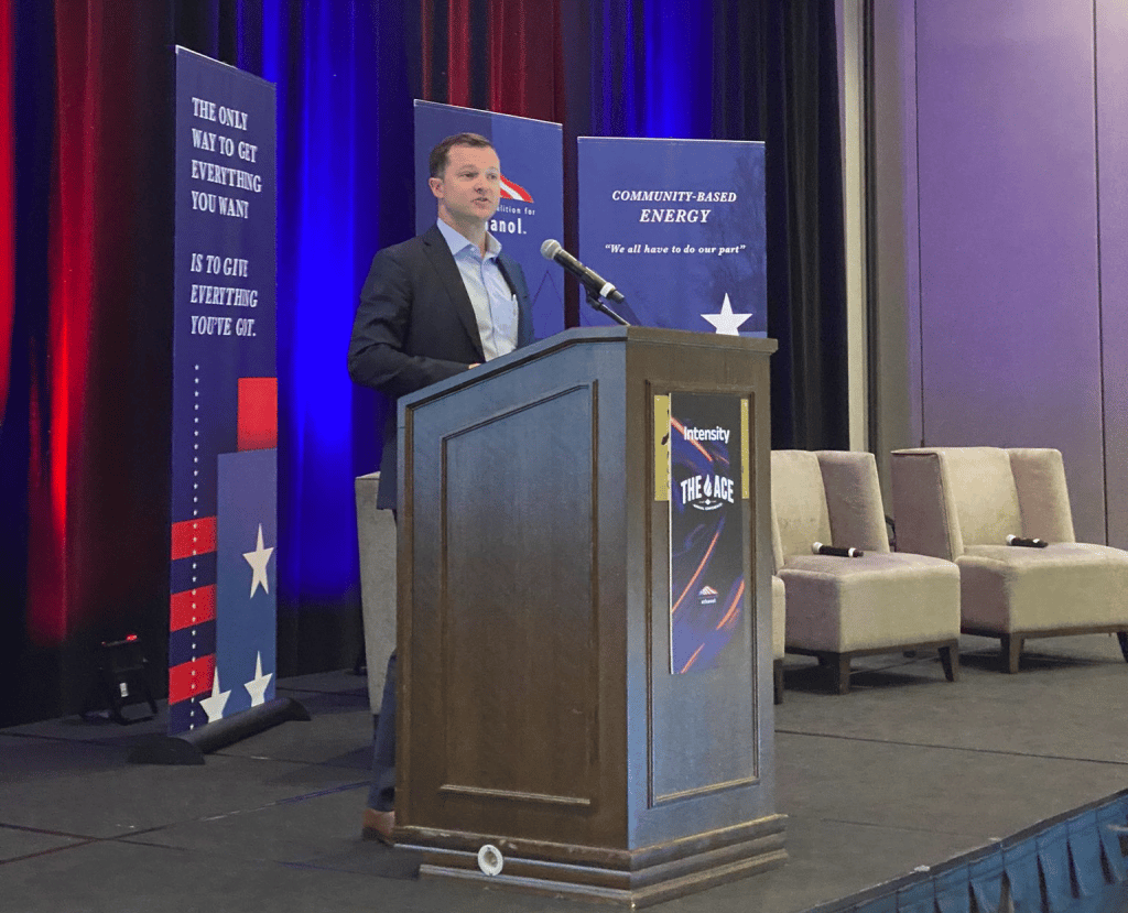 Ryan LeGrand speaking at a podium