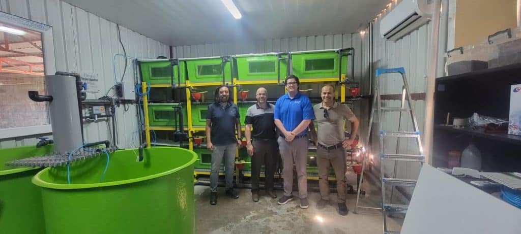 image of four men smiling