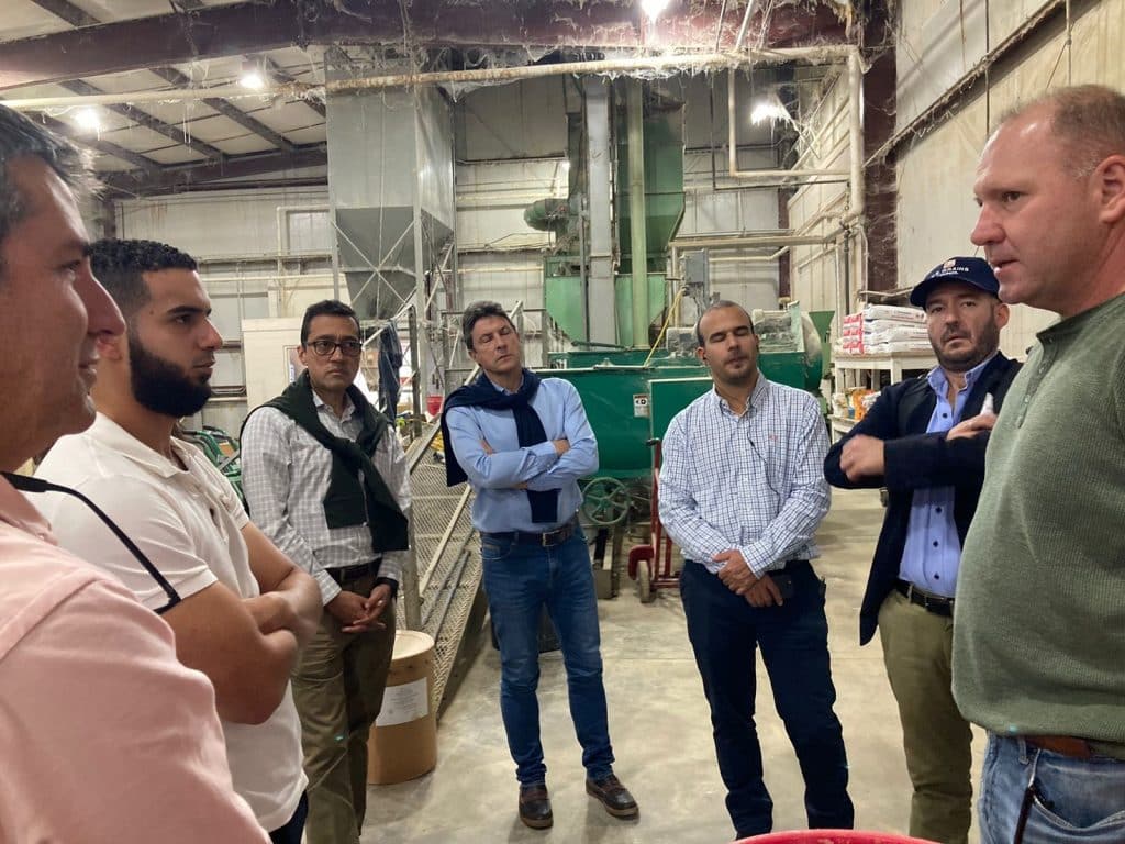 image of people talking in warehouse