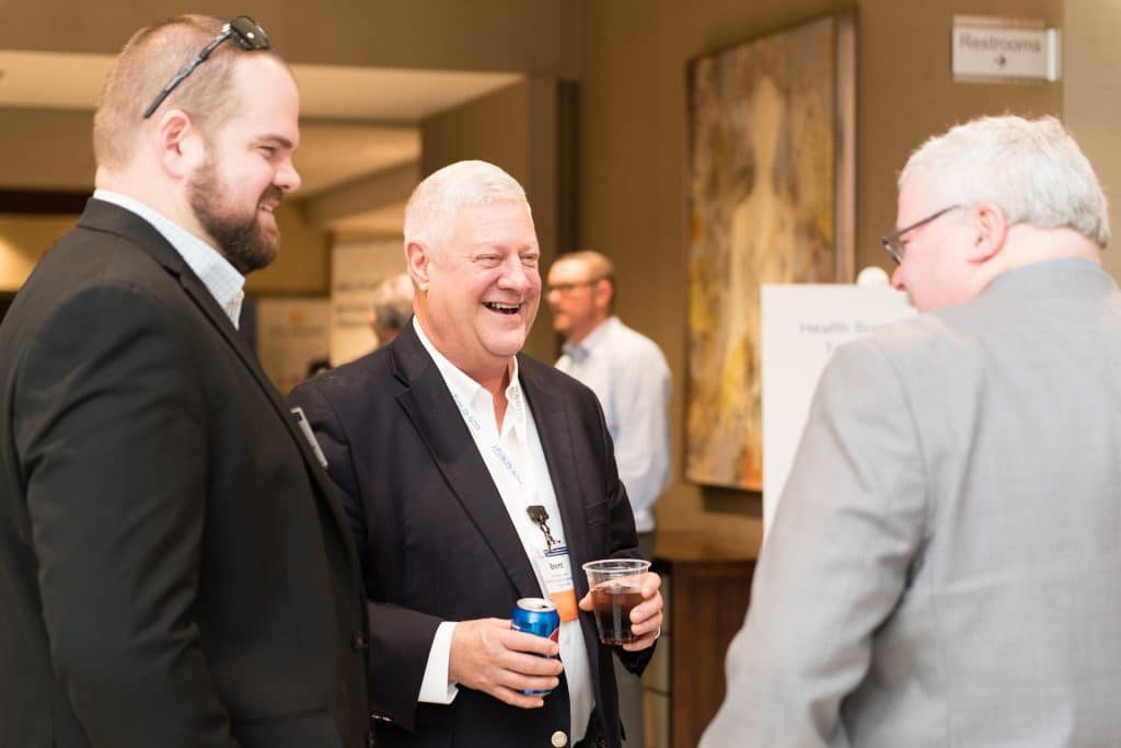 image of three men laughing