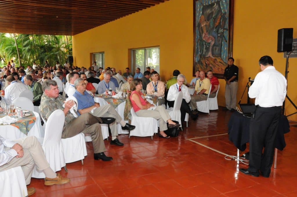 image of people listening to a speaker