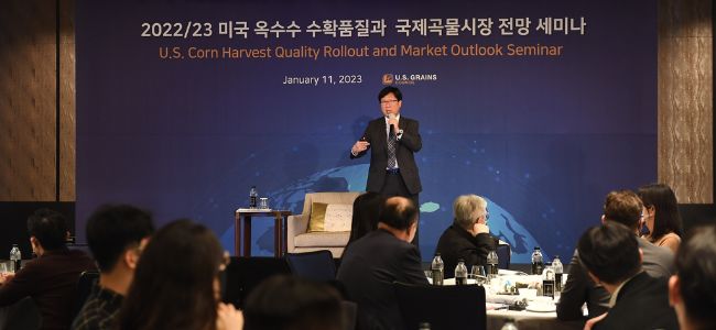 image of man presenting at conference