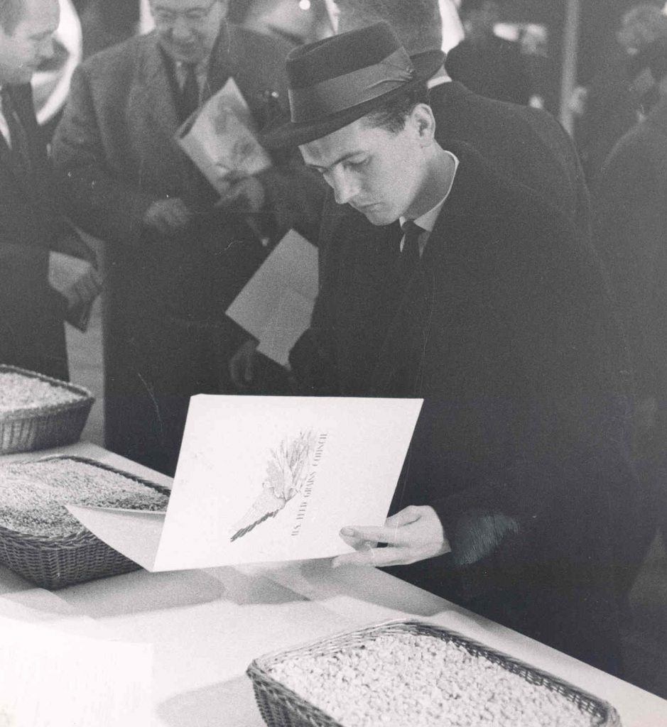 old image of man reading educational materials