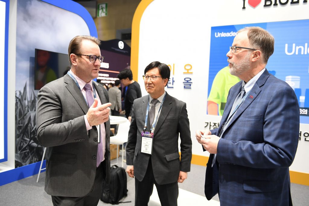 image of three men talking