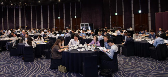 image of people listening to a presentation