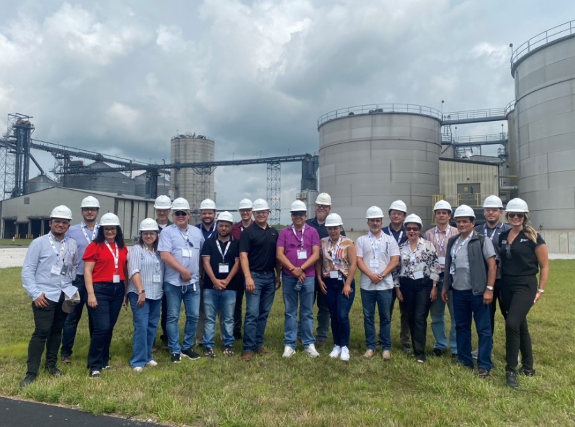 image of a group of people wearing hard hats at an ethanol plant