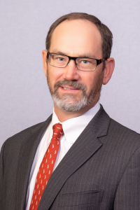 headshot of Tim Lust