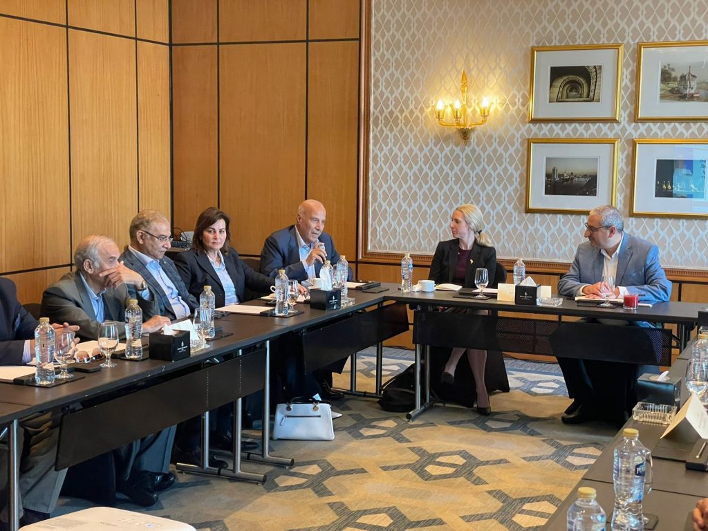A group of people sitting around a table