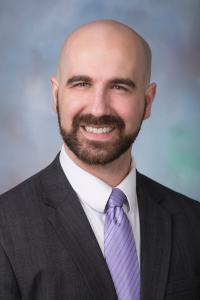 Headshot of Sam Clemence