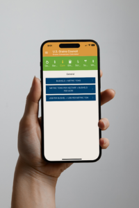 A person holding a phone with the USGBC conversion calculator open