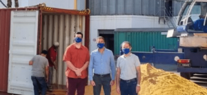 image of men in front of DDGS