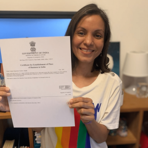 image of woman holding piece of paper