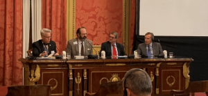 image of men on a discussion panel